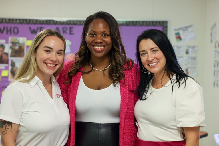 Sarah White (Senior Director of Operations), Dr. Patrice Johnson (CEO) is in the middle, Jacki Lane (Director of Education Programs)