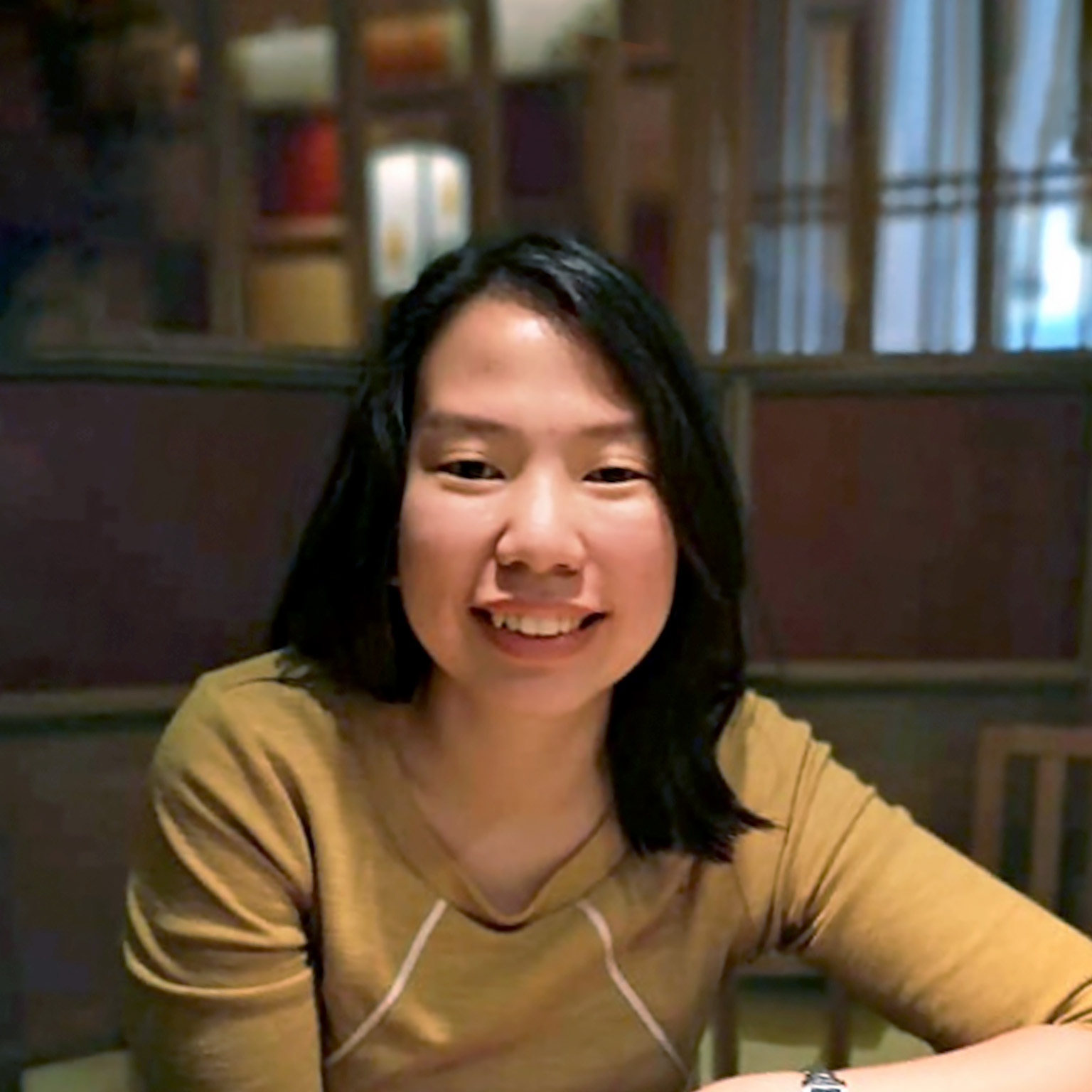 A business woman smiling at the camera